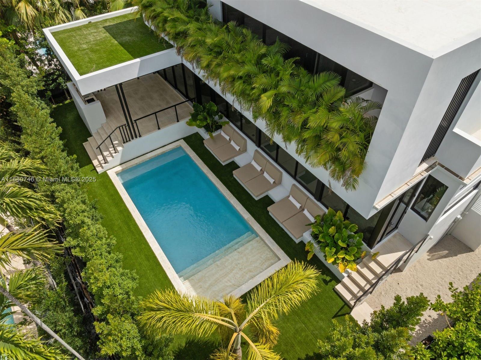 650 Warren Lane Key Biscayne, FL 33149 - Photo 2 of 34 a view of a yard