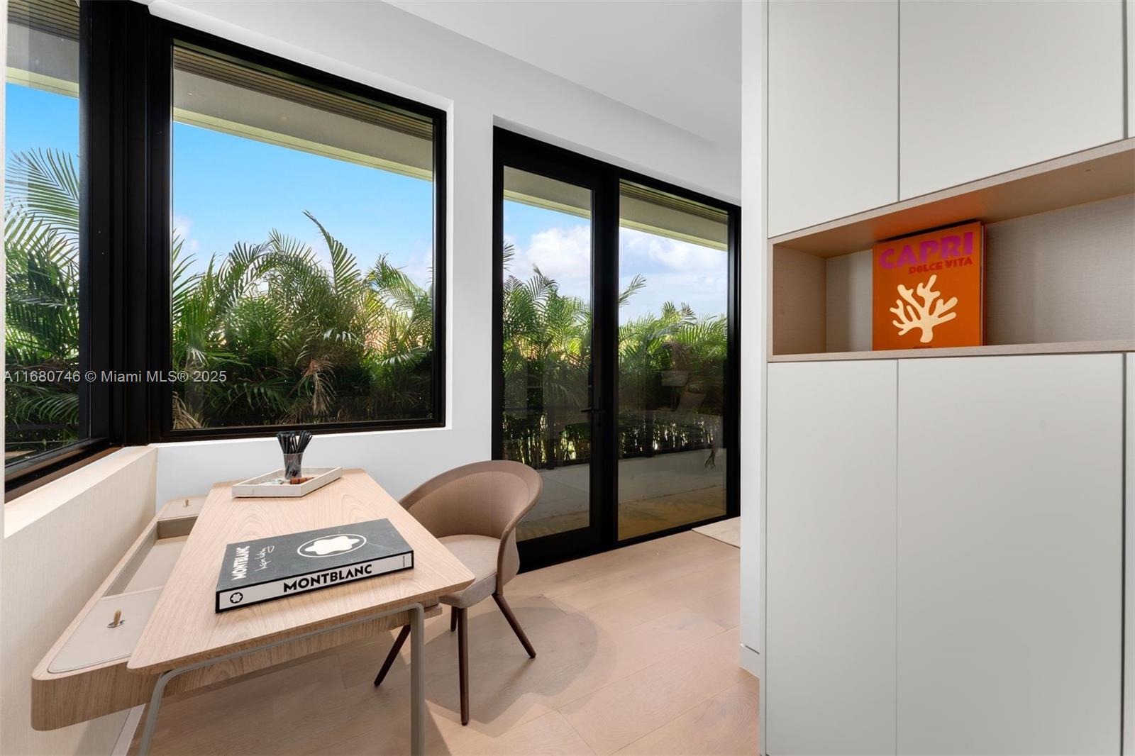 650 Warren Lane Key Biscayne, FL 33149 - Photo 24 of 34 a room with furniture and a large window