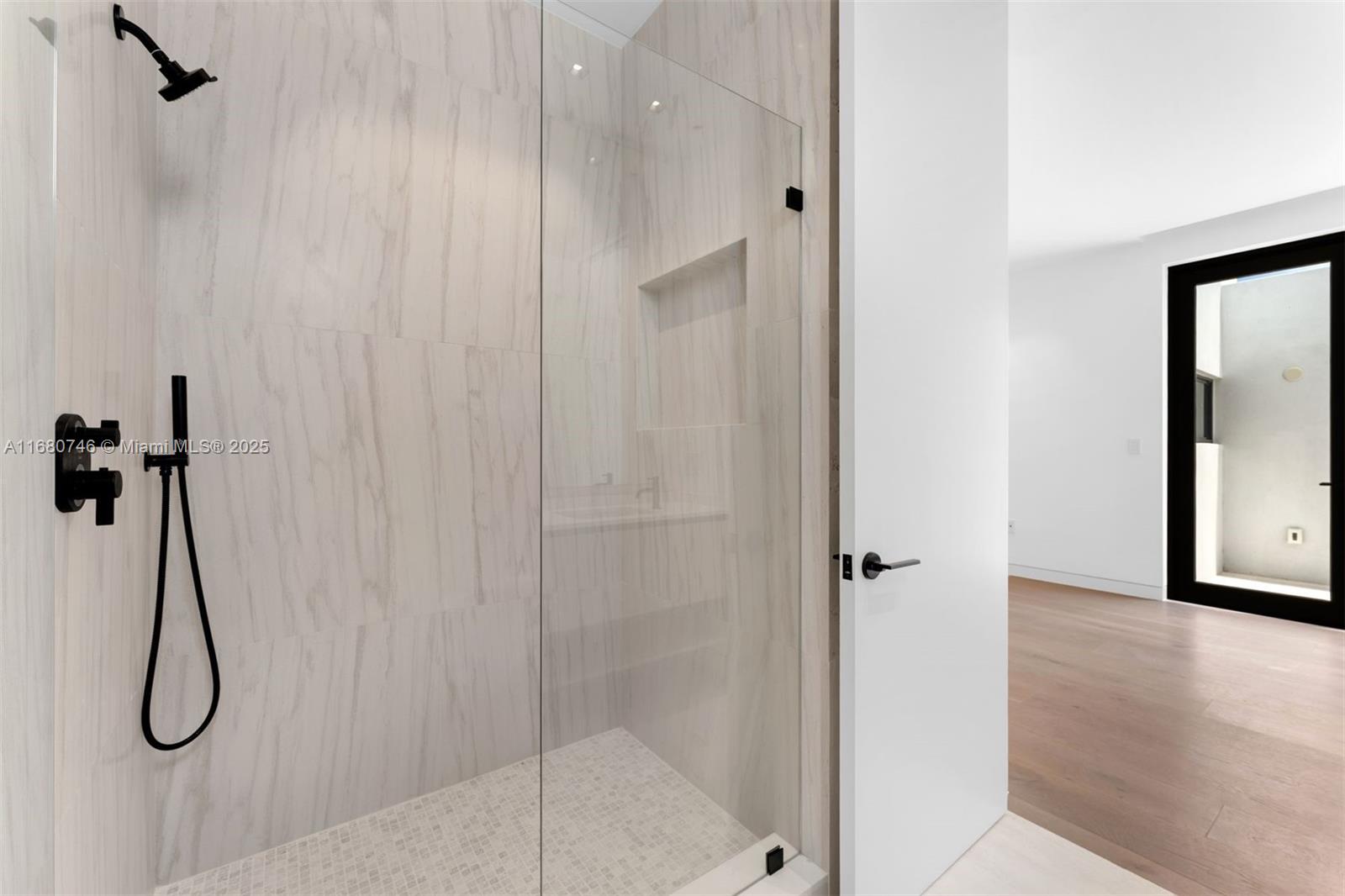 650 Warren Lane Key Biscayne, FL 33149 - Photo 34 of 34 a bathroom with a shower