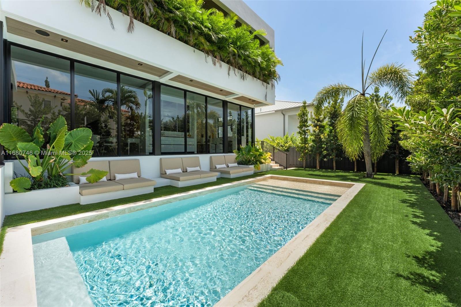 650 Warren Lane Key Biscayne, FL 33149 - Photo 7 of 34 a view of swimming pool with a patio