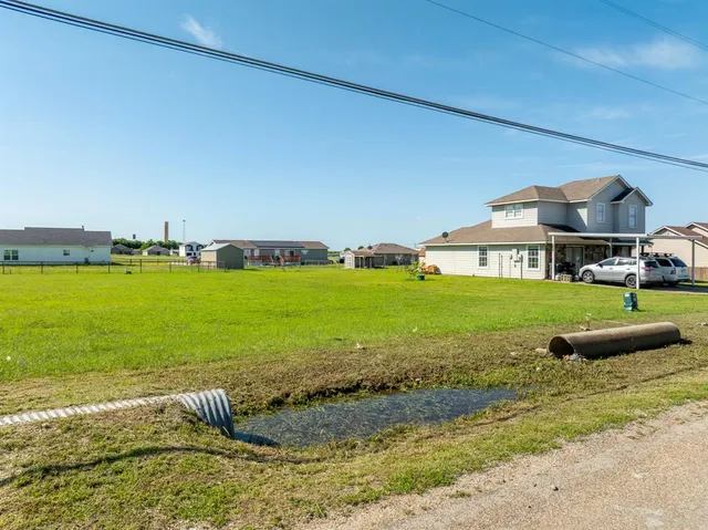a view of a terrace with a big yard