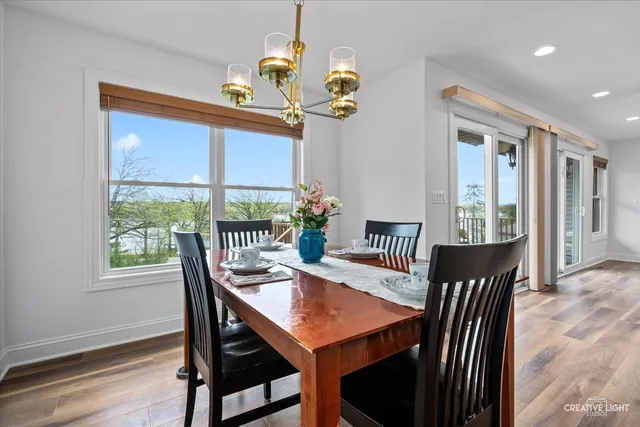 a view of a dining room with furniture window and outside view