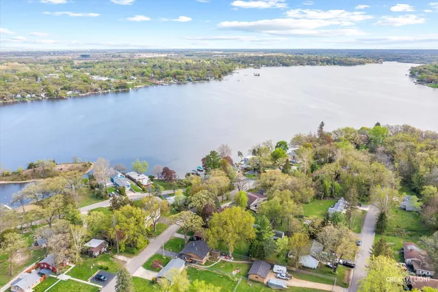 a view of a lake with a houses