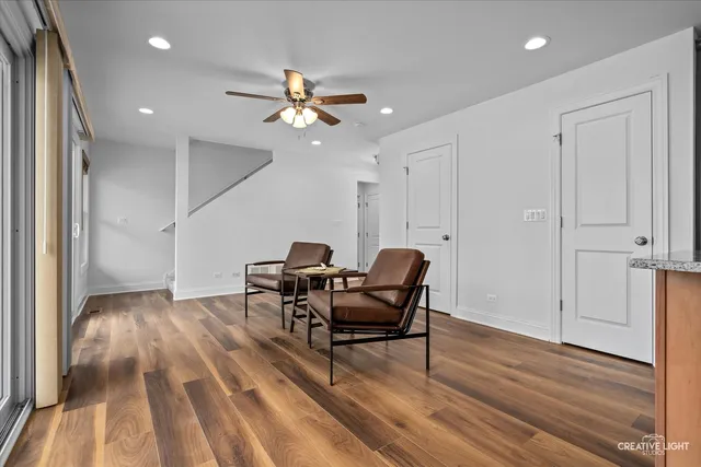 a view of a livingroom with furniture and wooden floor