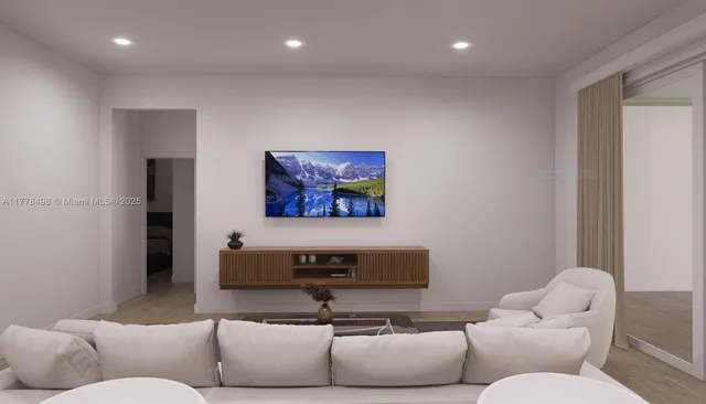 a living room with furniture and a couch