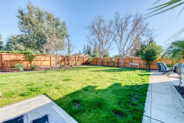 a view of a backyard with a garden
