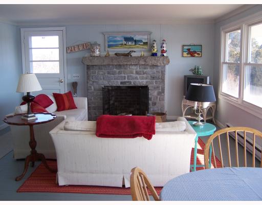 201 Prospect Road South Kingstown, RI 02879 - Photo 3 of 8 Living Room. Beautiful cobblestone fireplace in Living Area