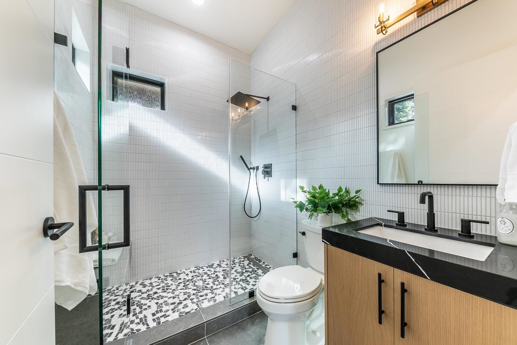 9291 Brae Road Truckee, CA 96161 - Photo 12 of 21 a bathroom with a sink toilet and shower