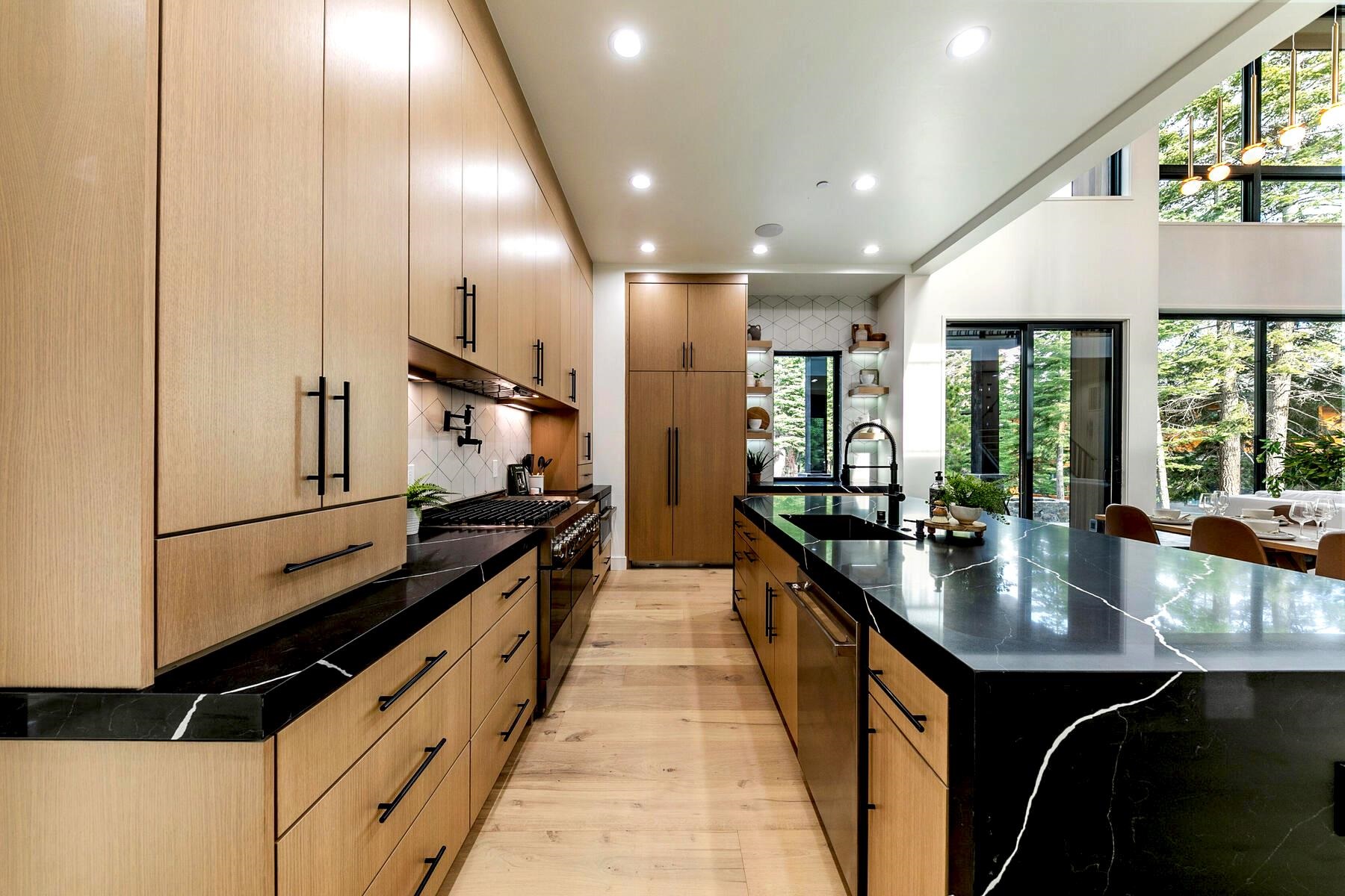9291 Brae Road Truckee, CA 96161 - Photo 6 of 21 a kitchen with stainless steel appliances a sink stove and cabinets