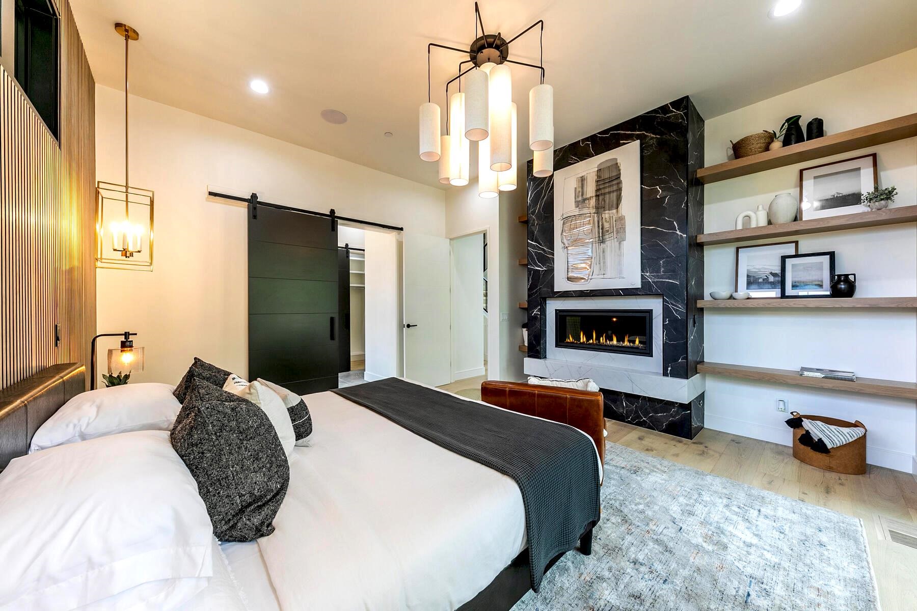 9291 Brae Road Truckee, CA 96161 - Photo 8 of 21 a bedroom with a bed flat screen tv and dresser