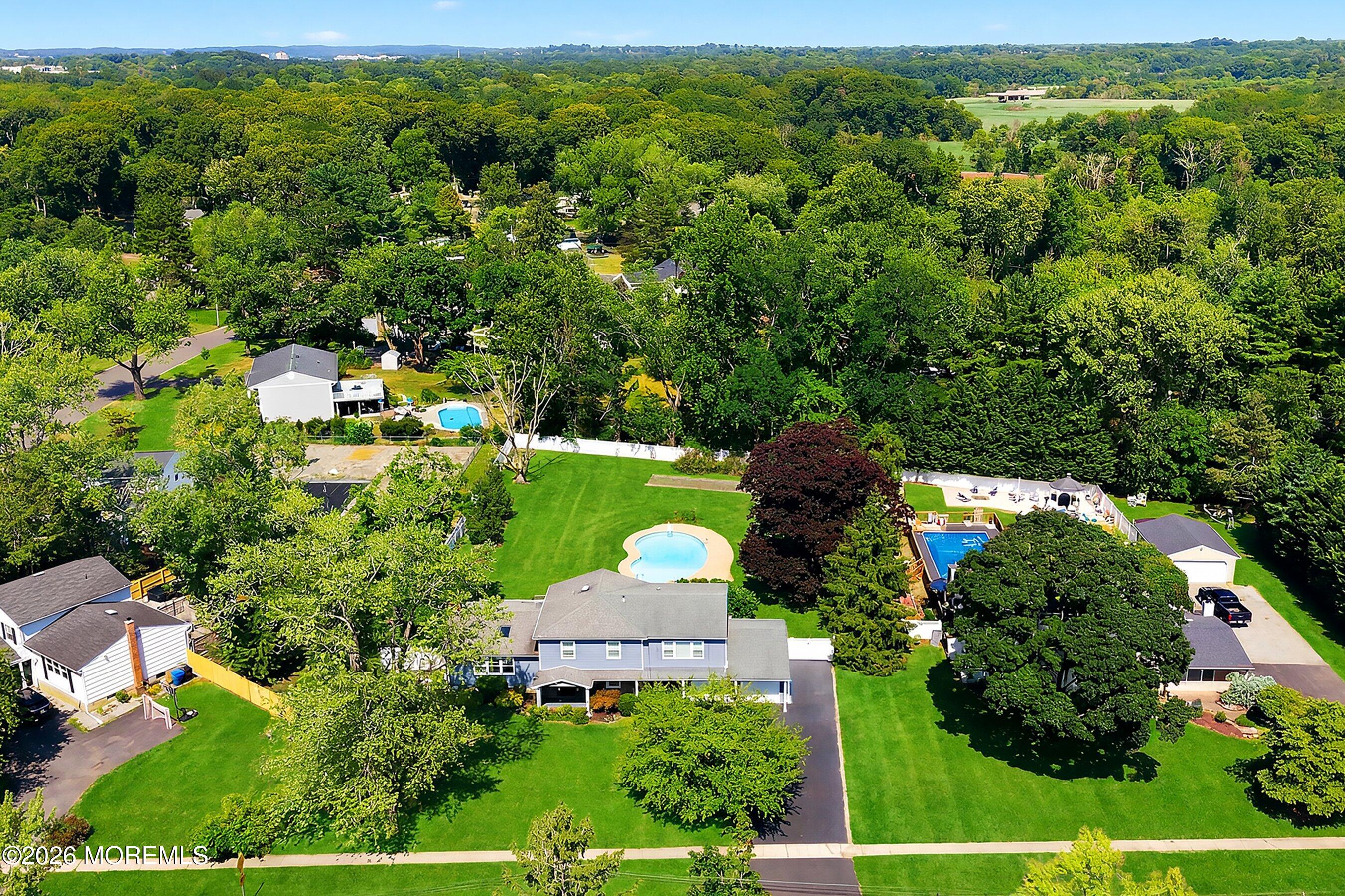 83 Swimming River Road Lincroft, NJ 07738 - Photo 42 of 51 03-Front Aerial