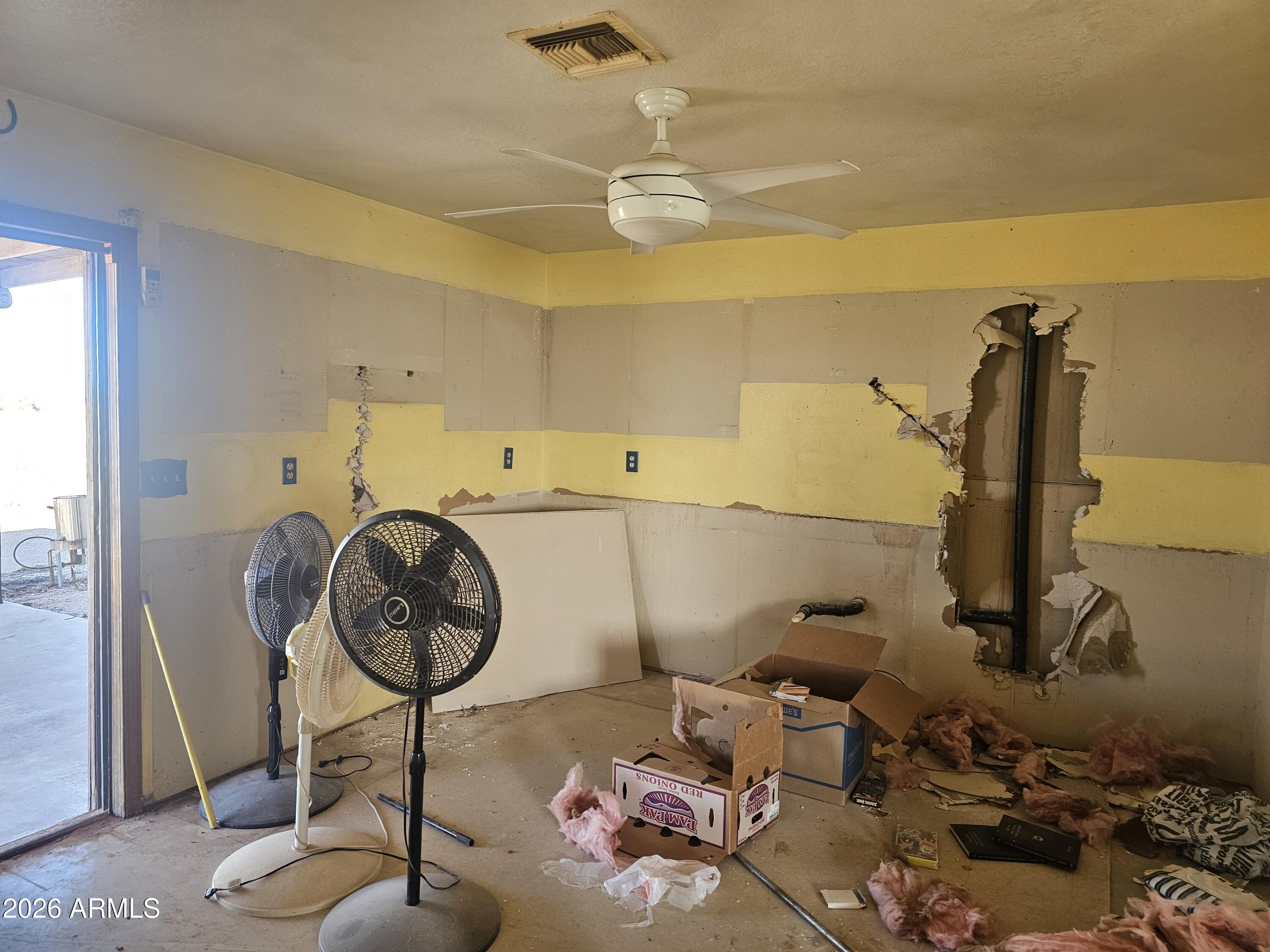 3613 North Papoose Road Casa Grande, AZ 85193 - Photo 13 of 19 a room with lots of furniture and chandelier