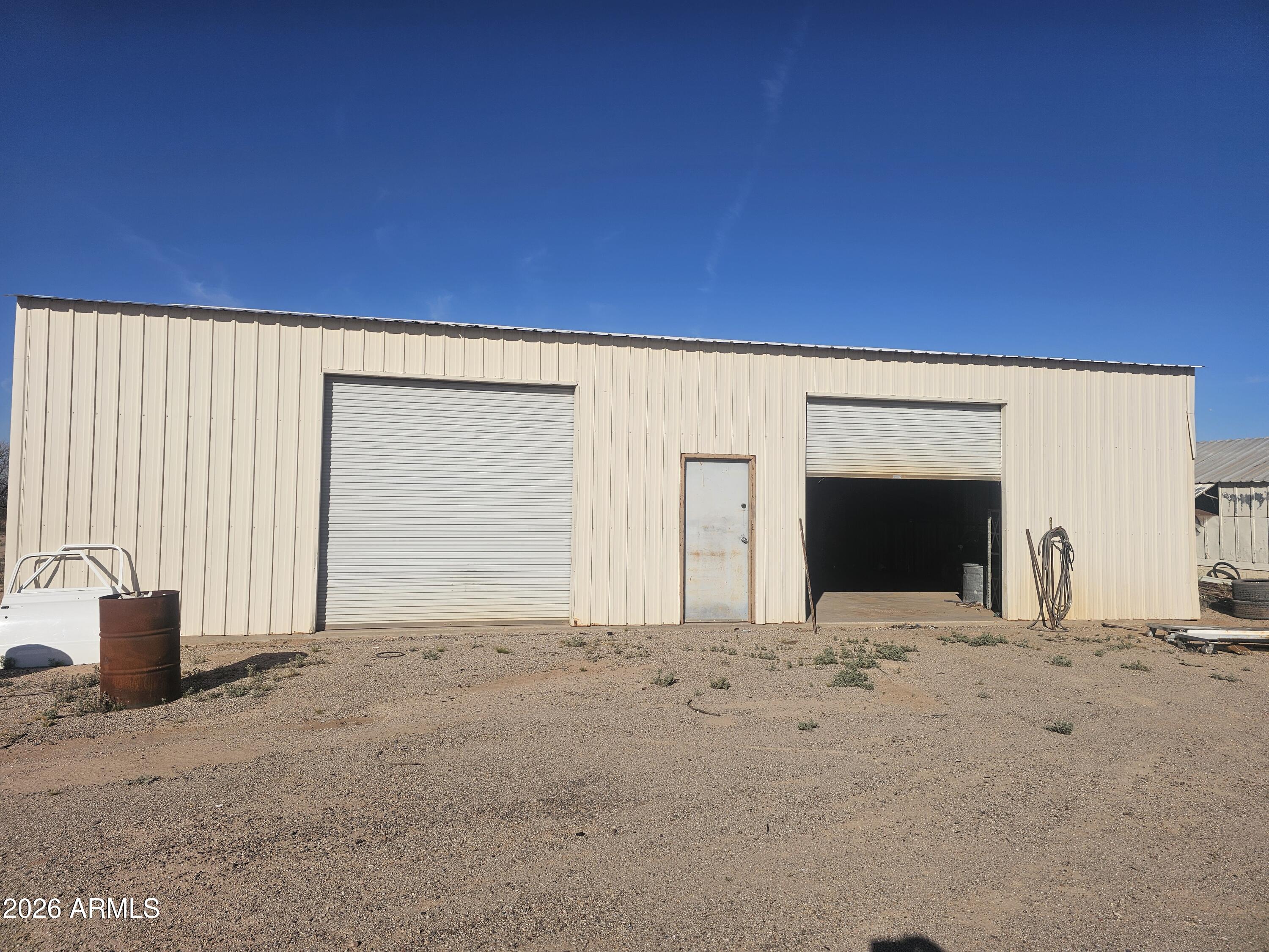 3613 North Papoose Road Casa Grande, AZ 85193 - Photo 4 of 19 a view of an empty room with a fireplace