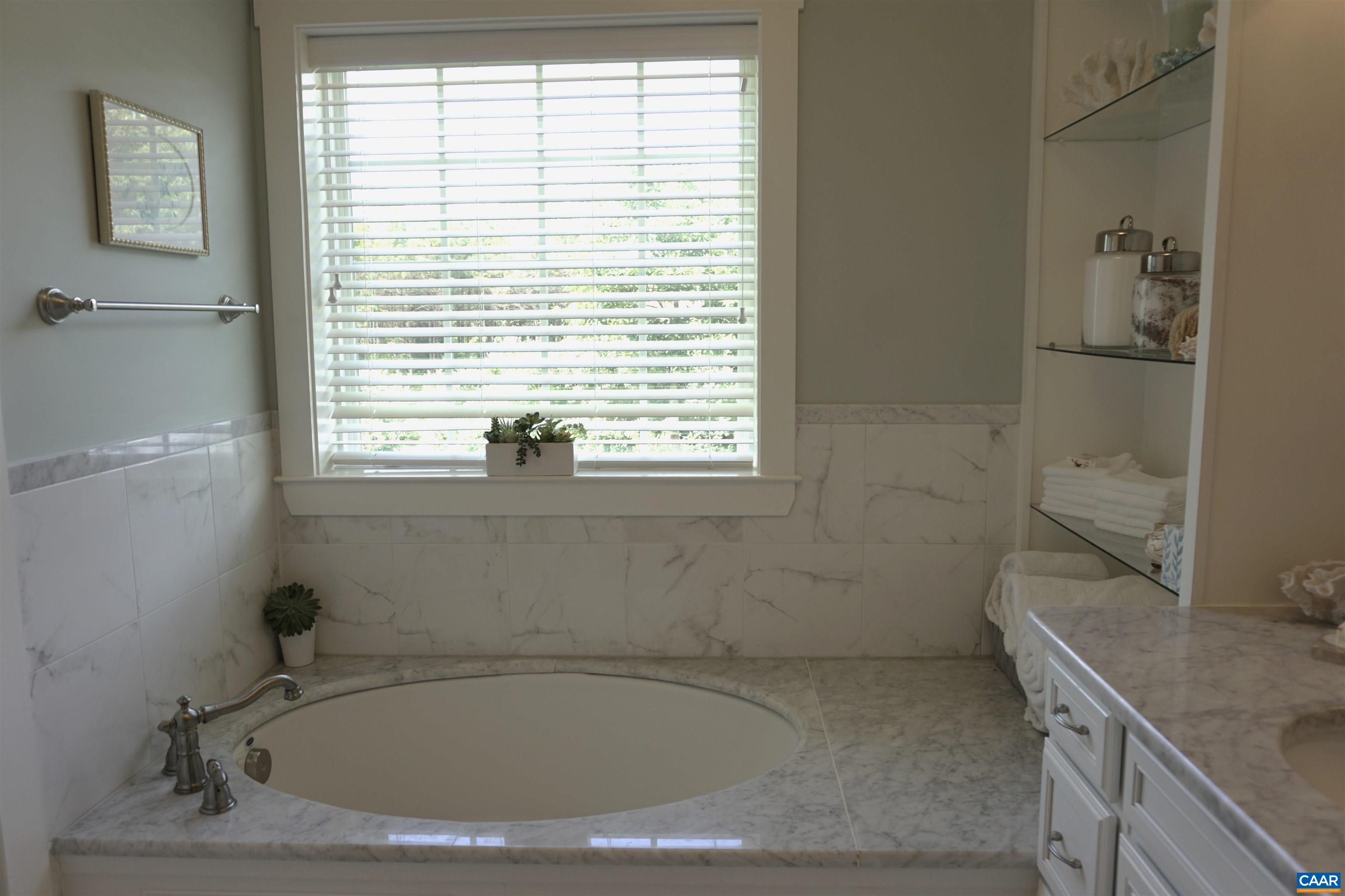 266 Ridgeview Drive Ruckersville, VA 22968 - Photo 14 of 20 a bathroom with sink and window