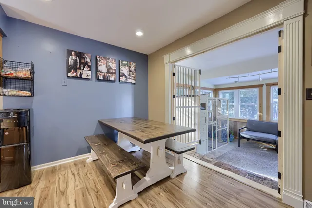 a kitchen with granite countertop a stove a sink dishwasher and a refrigerator