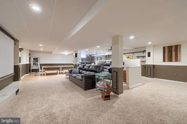 a living room with furniture and a couch