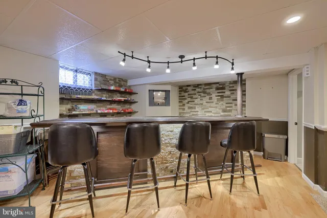 a bathroom with a sink toilet and a vanity