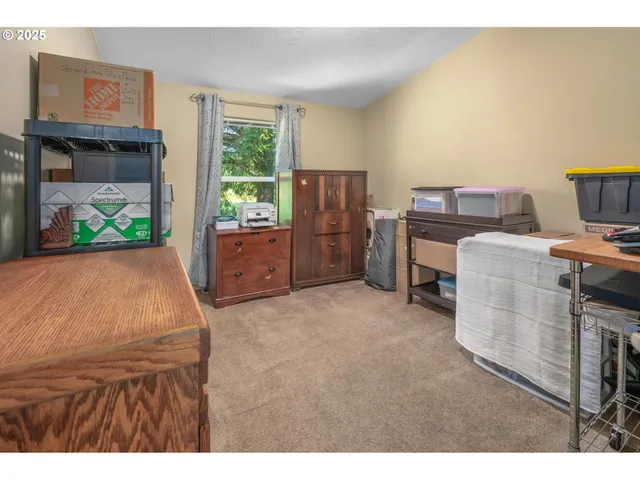 a room with furniture and a window