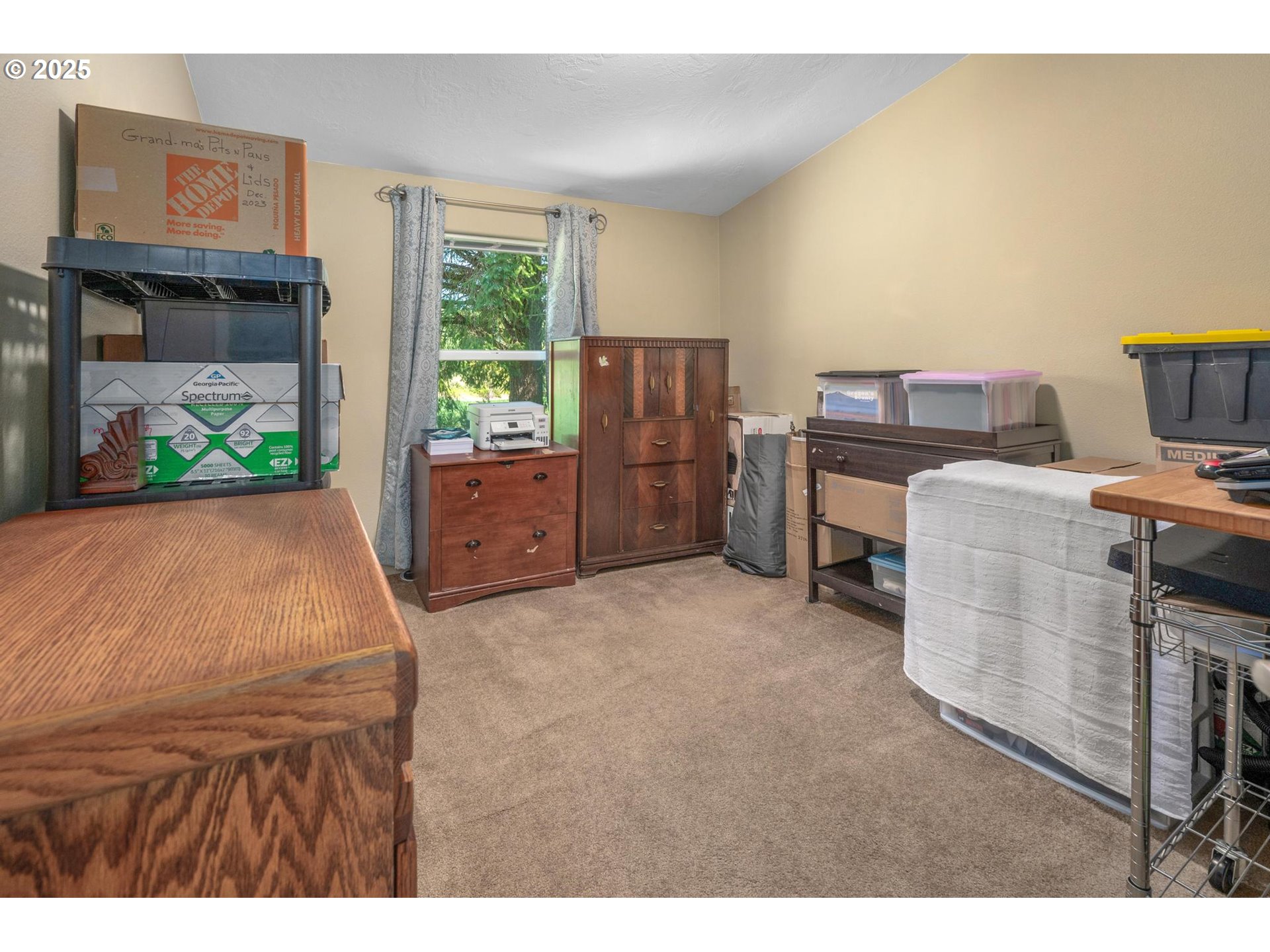 20270 Northwest Pihl Road Banks, OR 97106 - Photo 27 of 43 a room with furniture and a window