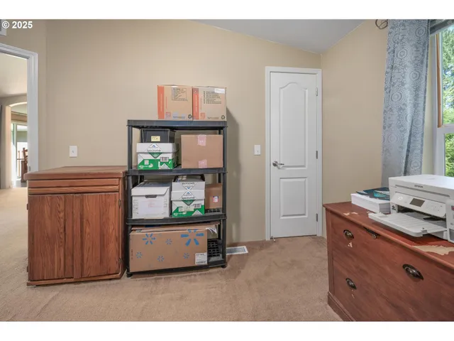 a kitchen with stainless steel appliances a refrigerator and a stove