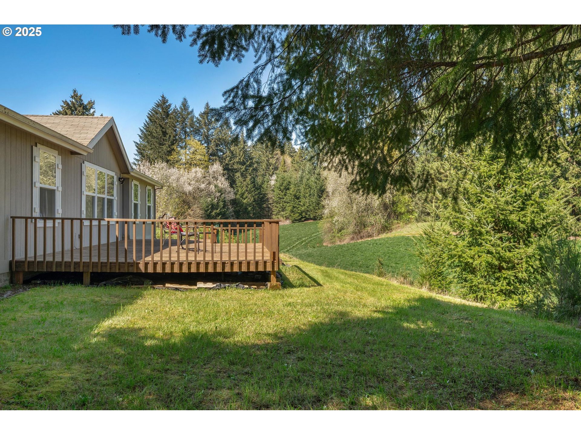 20270 Northwest Pihl Road Banks, OR 97106 - Photo 6 of 43 a view of a porch with a yard
