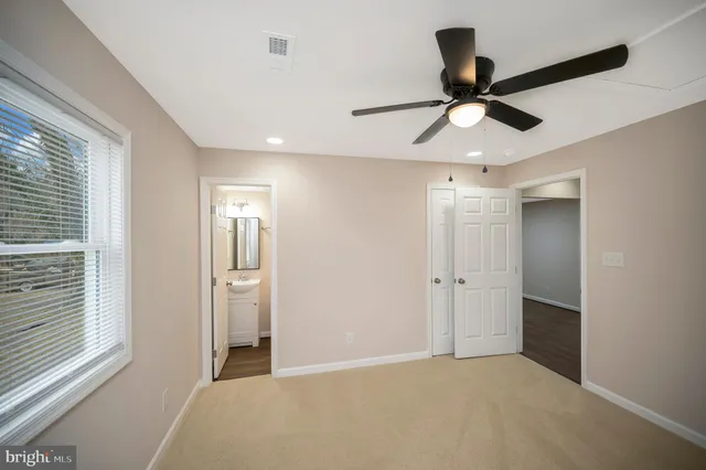 a view of an empty room and window