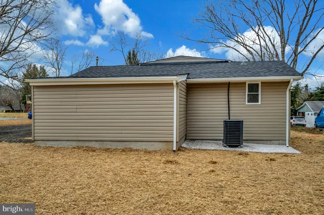 a front view of house with a yard