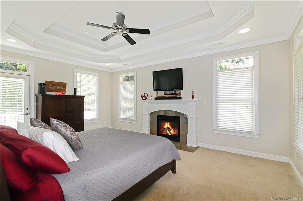 3458 Blue Jay Pass Fort Mill, SC 29708 - Photo 16 of 33 a bedroom with a bed and a television