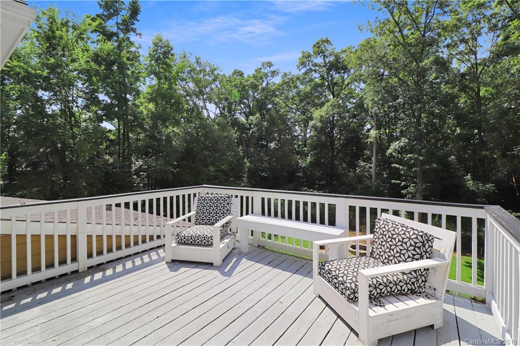 3458 Blue Jay Pass Fort Mill, SC 29708 - Photo 17 of 33 a view of a wooden deck with a bench