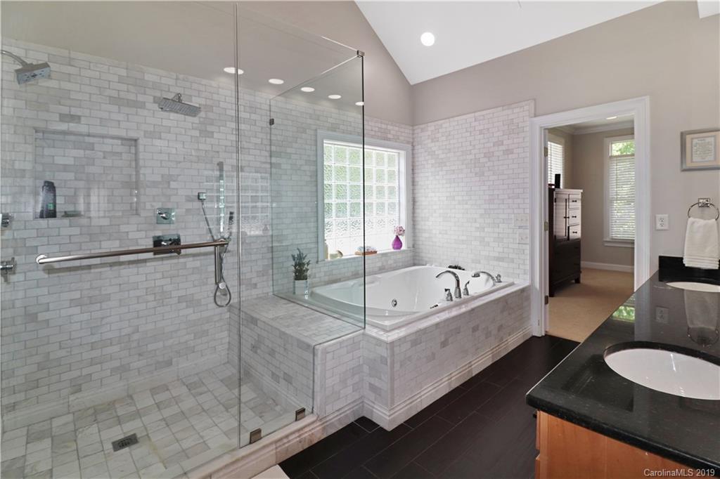 3458 Blue Jay Pass Fort Mill, SC 29708 - Photo 20 of 33 a spacious bathroom with a bathtub and a shower