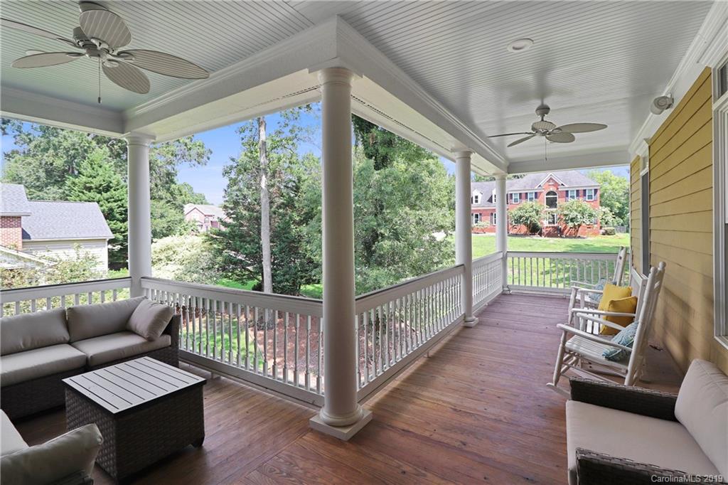 3458 Blue Jay Pass Fort Mill, SC 29708 - Photo 25 of 33 a living room with furniture and a floor to ceiling window