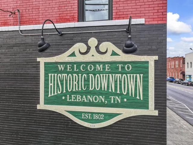 a sign that is on the wall of building