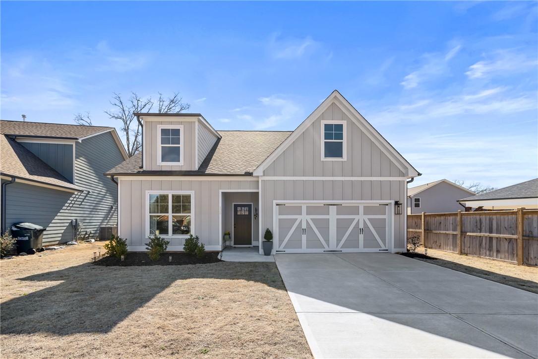 135 Bowers Estates Road Hartwell, GA 30643 - Photo 2 of 35 This newly constructed home boasts a charming facade and a spacious two-car garage.