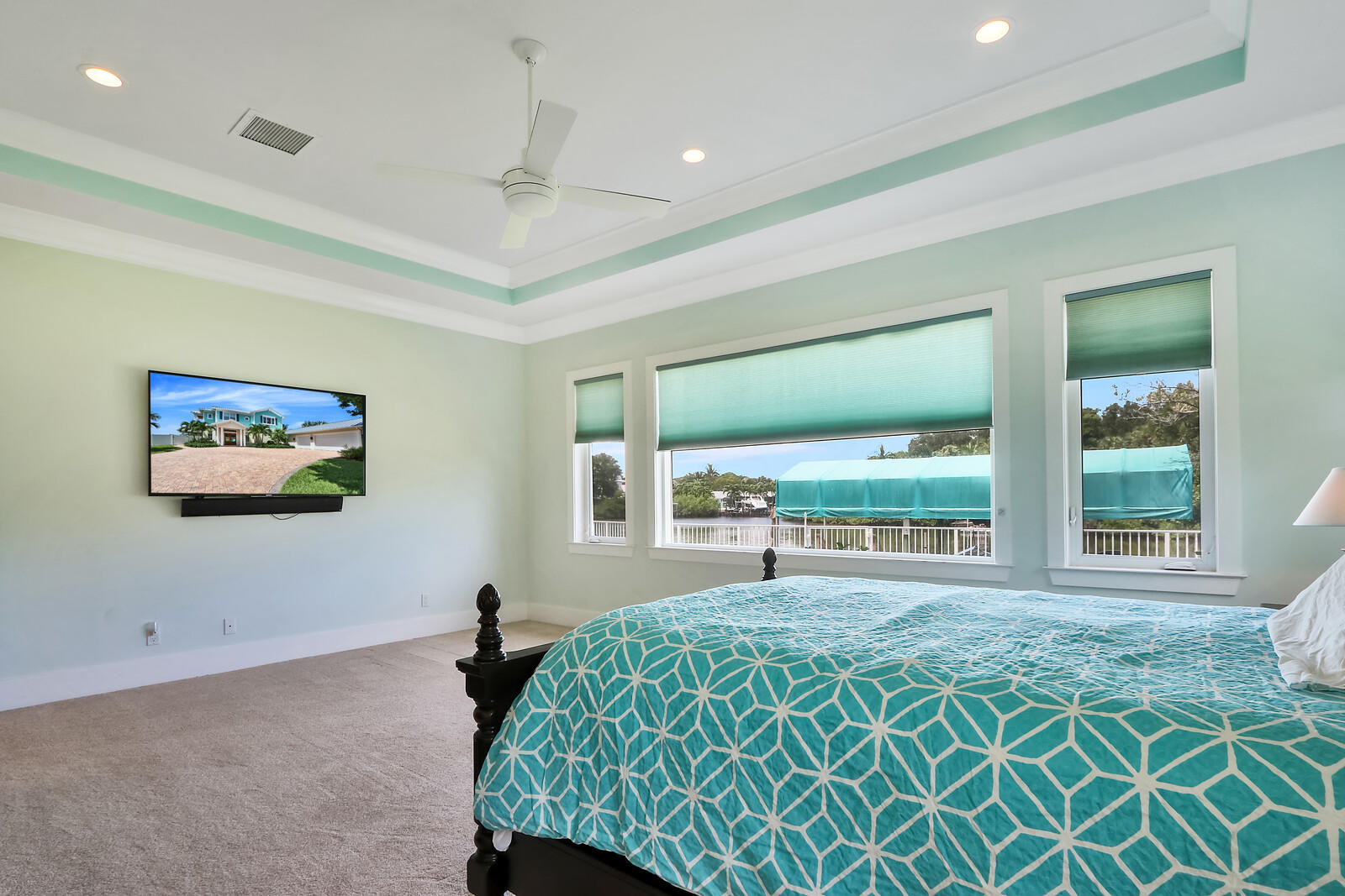 1304 Peninsular Road Jupiter, FL 33469 - Photo 20 of 67 a bed room with a bed and a large window
