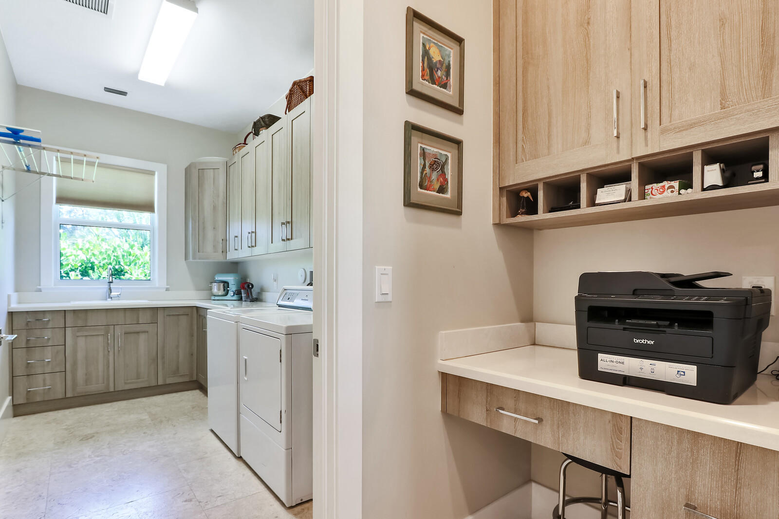 1304 Peninsular Road Jupiter, FL 33469 - Photo 36 of 67 a kitchen with stainless steel appliances cabinets and a window
