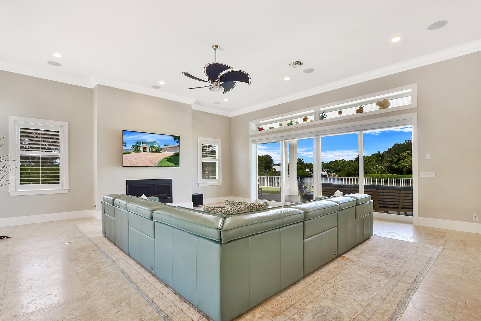 1304 Peninsular Road Jupiter, FL 33469 - Photo 5 of 67 a living room with furniture and a large window