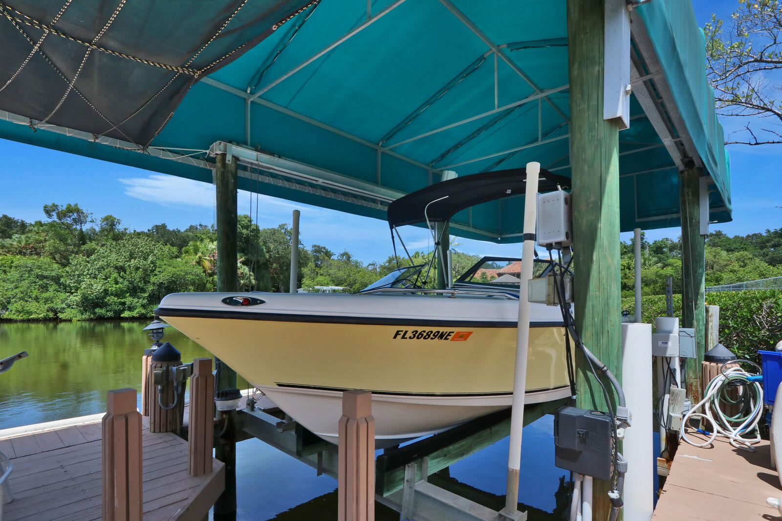 1304 Peninsular Road Jupiter, FL 33469 - Photo 51 of 67 a view of a swimming pool with a patio