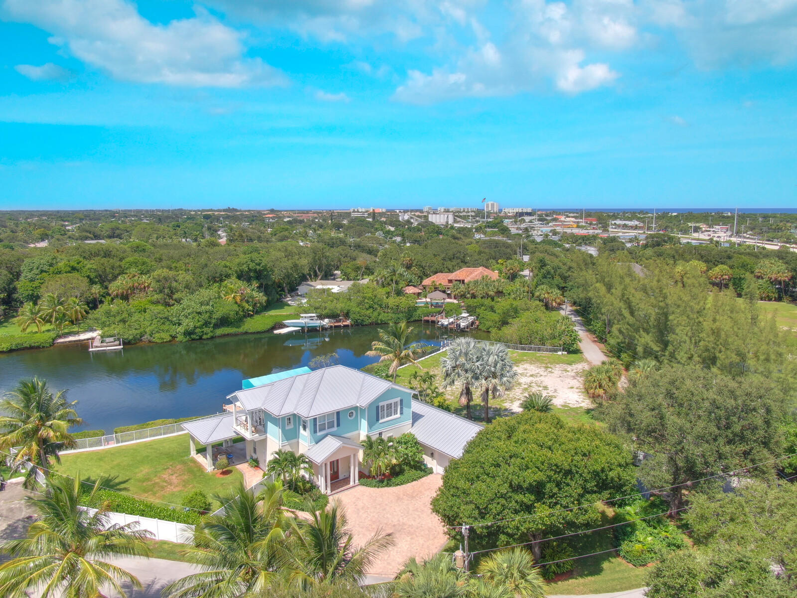 1304 Peninsular Road Jupiter, FL 33469 - Photo 53 of 67 a view of a lake with a city