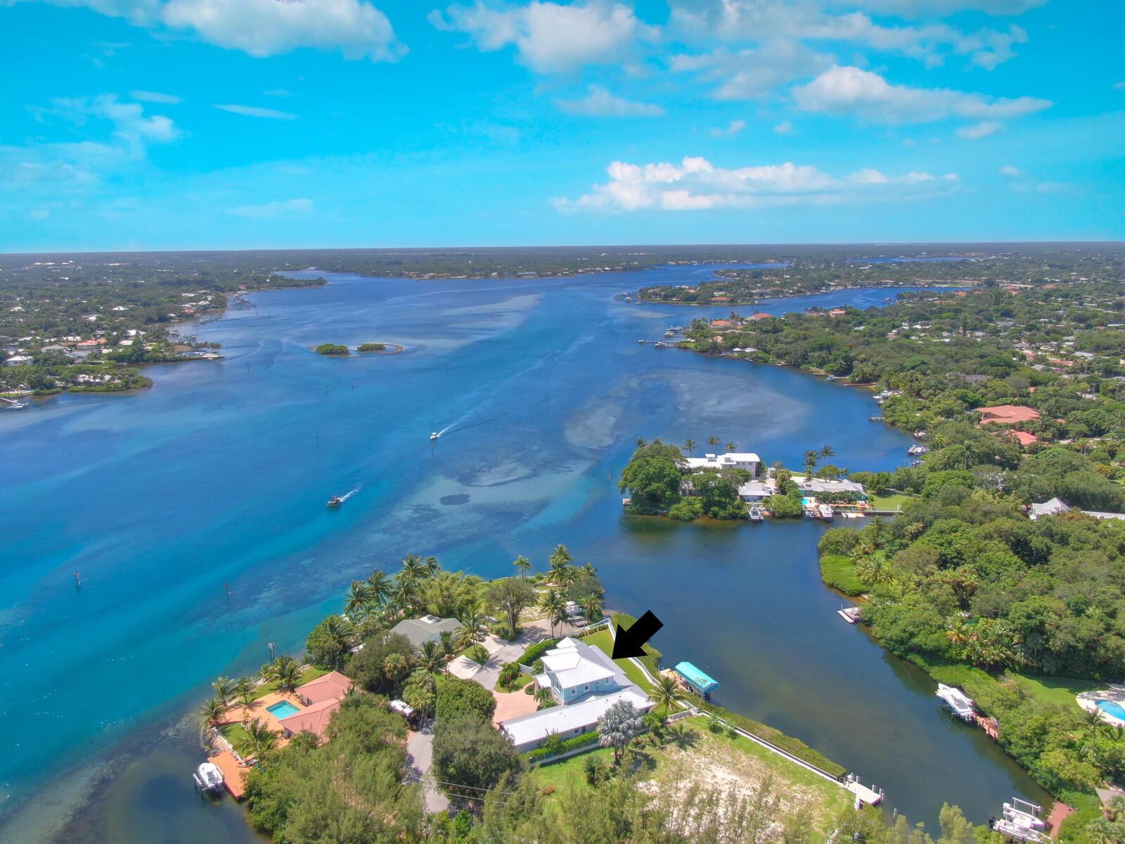 1304 Peninsular Road Jupiter, FL 33469 - Photo 54 of 67 an aerial view of a houses with ocean view