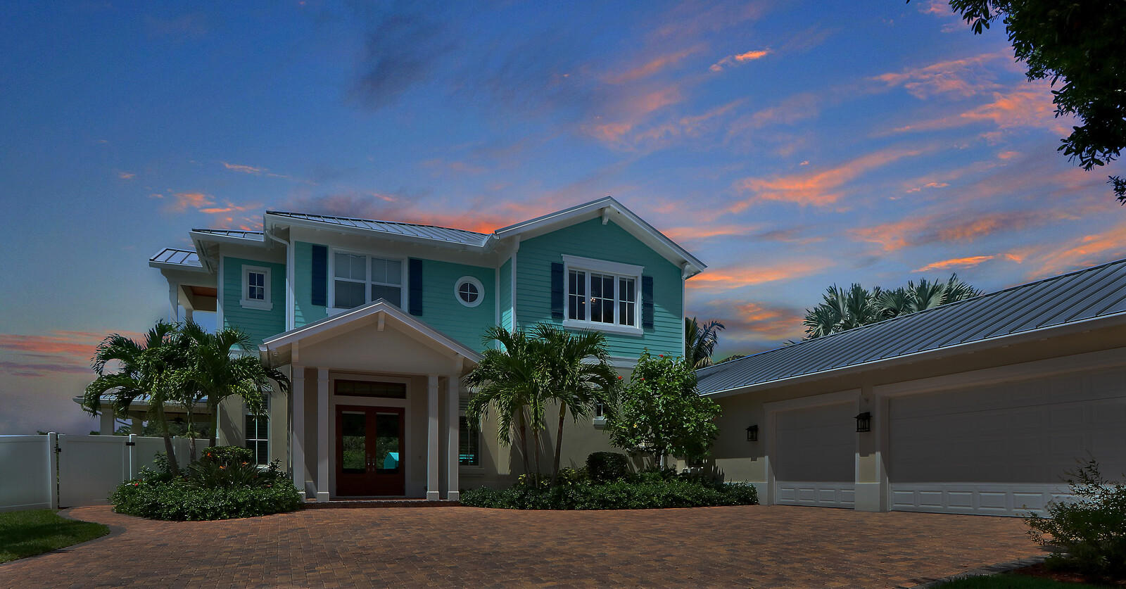 1304 Peninsular Road Jupiter, FL 33469 - Photo 64 of 67 a front view of a house with garden