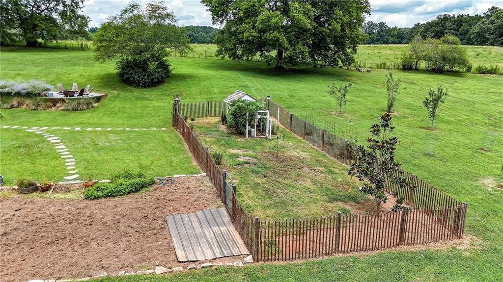 548 Tamarack Trail Canton, GA 30115 - Photo 21 of 83 a view of a backyard with large trees