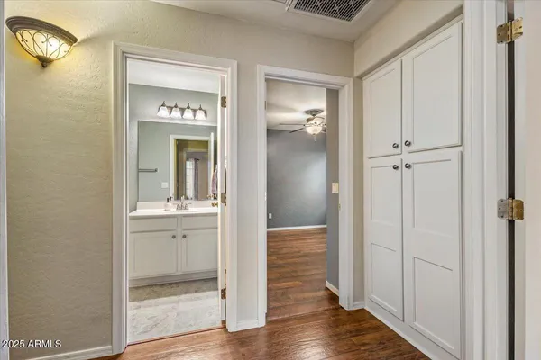 a bathroom with a sink toilet tub and shower