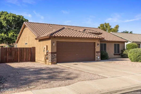 a front view of a house with a garage