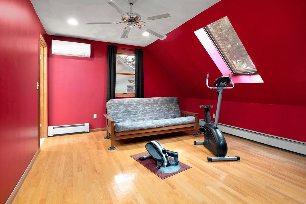 102 Orange Street Reading, MA 01867 - Photo 17 of 23 a room with gym equipment
