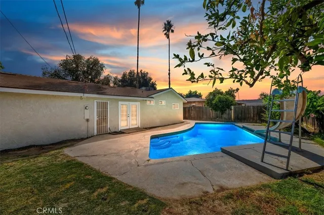 a house view with a backyard space