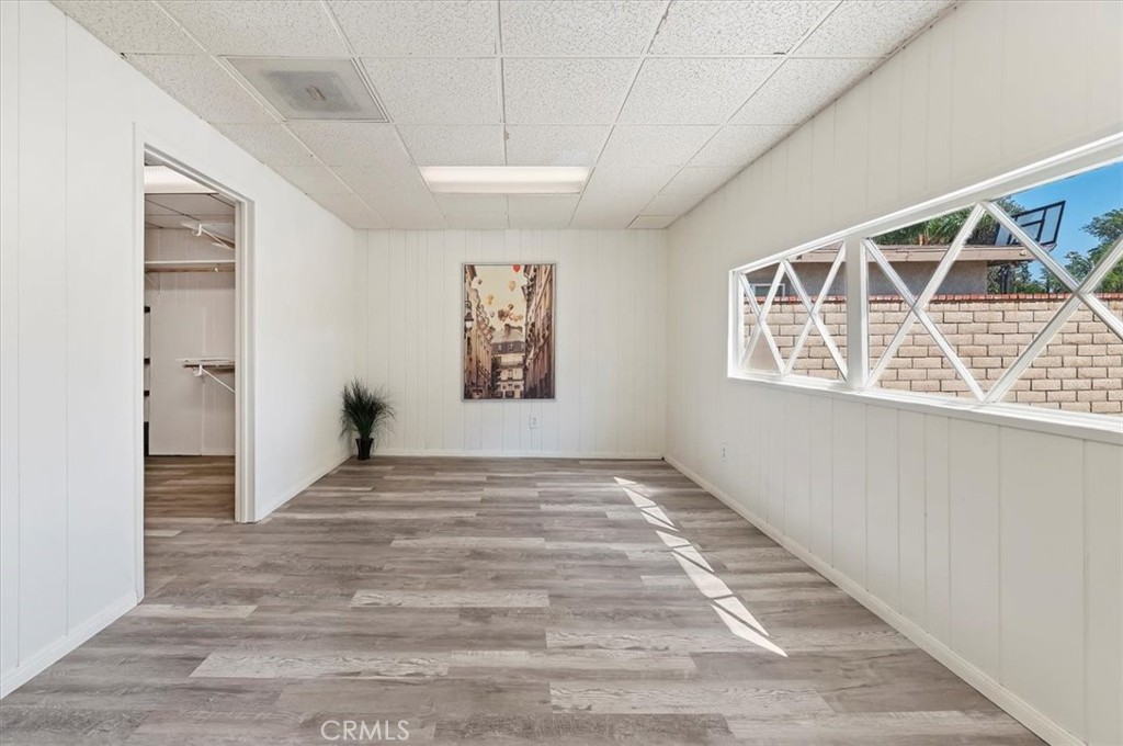 8797 Brunswick Avenue Riverside, CA 92503 - Photo 7 of 23 a view of empty room with windows