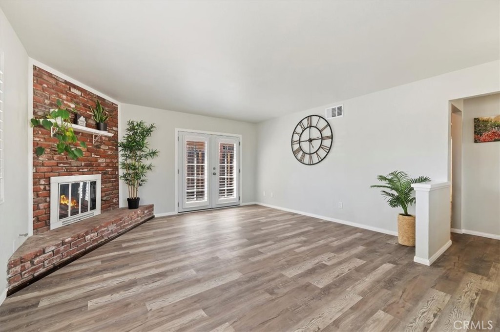 8797 Brunswick Avenue Riverside, CA 92503 - Photo 8 of 23 a view of an empty room with a window