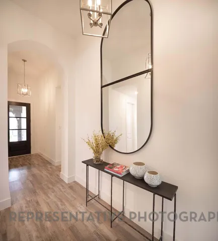 a outdoor space with patio the couches and a dining table with garden view