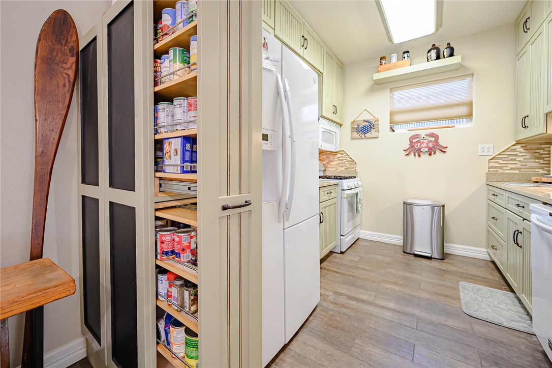 102 South 7th Street Fulton, TX 78358 - Photo 12 of 40 walk in closet with clothes and shoes