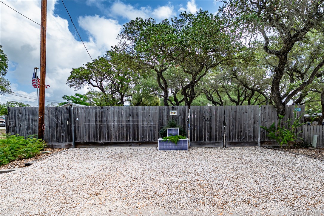 102 South 7th Street Fulton, TX 78358 - Photo 29 of 40 a view of garden with wooden fence